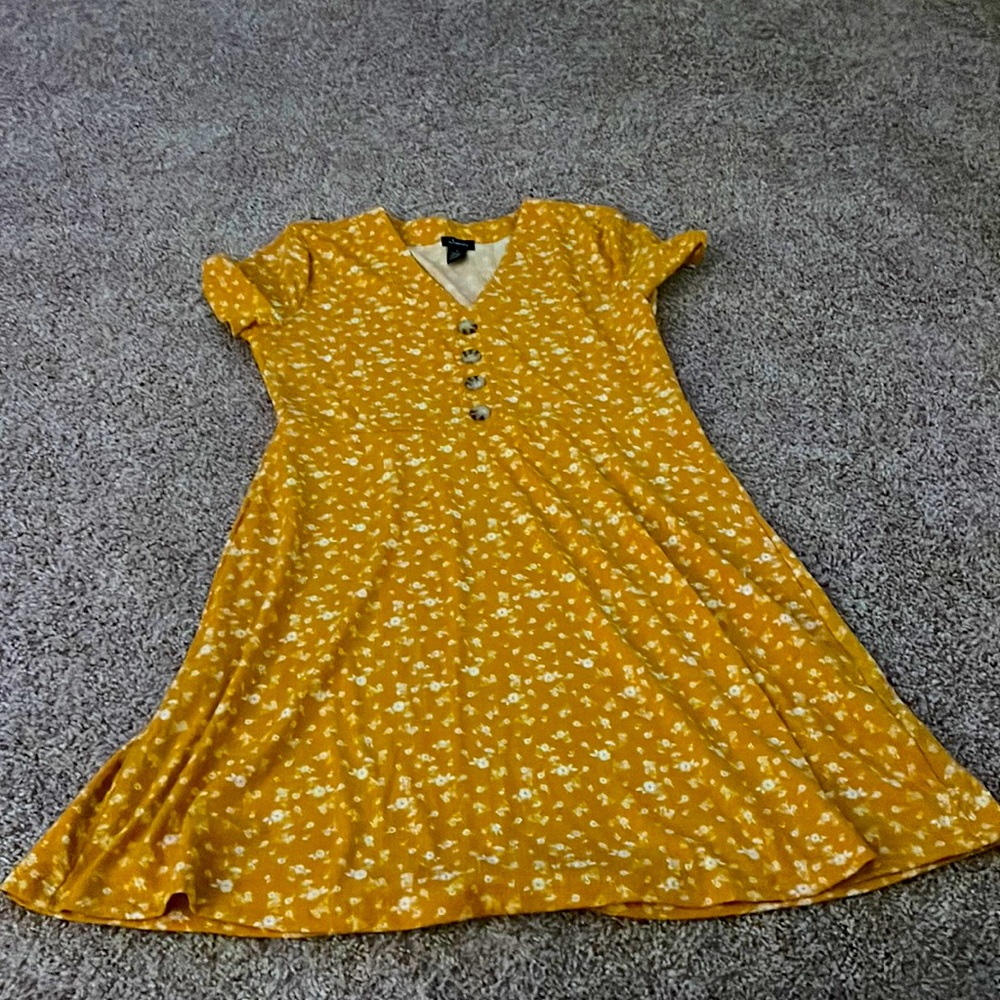 Knee length mustard yellow dress. Not clingy. Shallow v neck